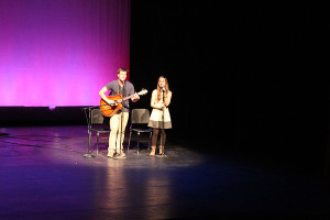 Emery Major, on guitar, and Eliza Wells sang a duet to the Jason Mraz hit “Lucky”. 