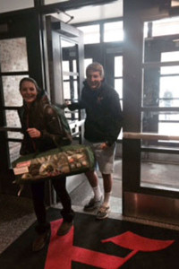 Junior Jessica Tyler and senior Matthew Sovich bring their tent to school preparing for their 24-hour school day.