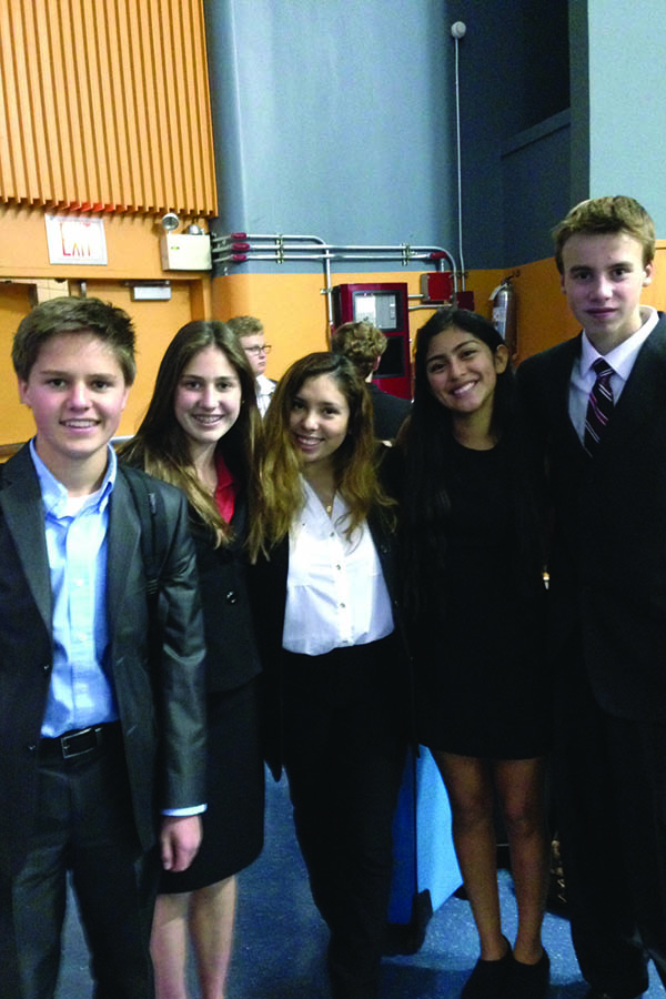 Juniors Robert and Ann Marie Abraham, Diana Flores, senior Francesca Olivos, and sophomore Connor Coyle pose during the national speech and debate tournament in New York on October 18th. 