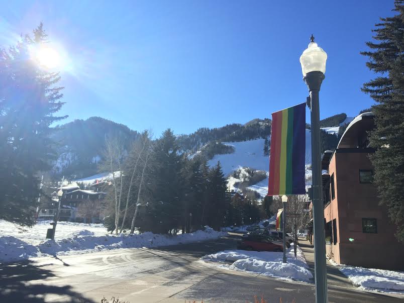 Every year, Aspen welcomes gay ski week with rainbow flags around town.