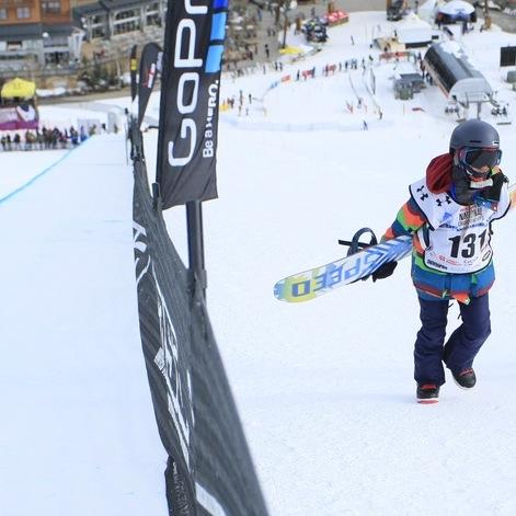 Isabella Borenstein walking up the half pipe and getting ready to shred.