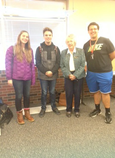 Students from the AHS Democrats Club pose with Marcia Neal after a Young Republicans Club meeting. From left,  Marta Galambos, Beauregard Burckart, Marcia Neal, and Brian Alvarez. 