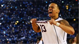Finals MVP Shabazz Napier celebrates Connecticut’s 60-54 win over Kentucky in the championship game of the 2014 March Madness tournament 