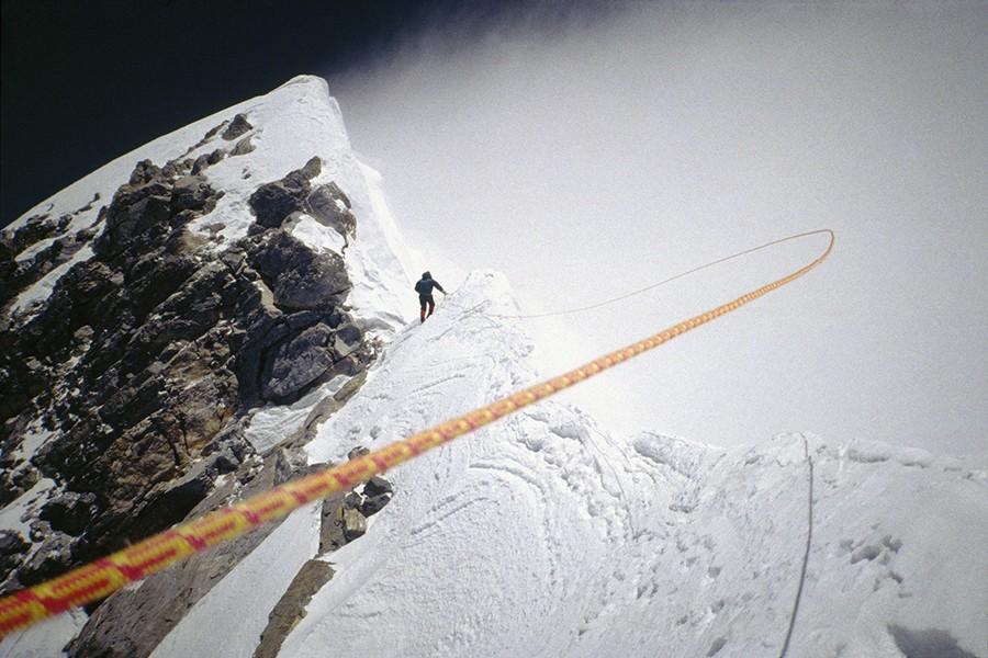 Anatoli Boukreev approaching the Hillary Step at just under 29,000’ as Neal Beidleman belays him