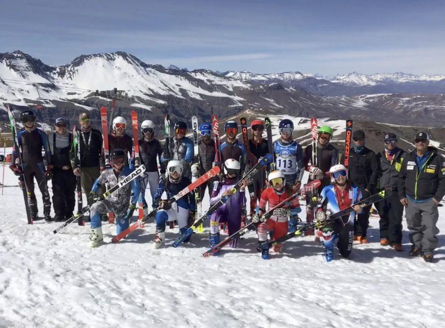 Toribio and Edelman pose alongside selected skiers at the Tri-Regional camp in La Parva, Chile. 