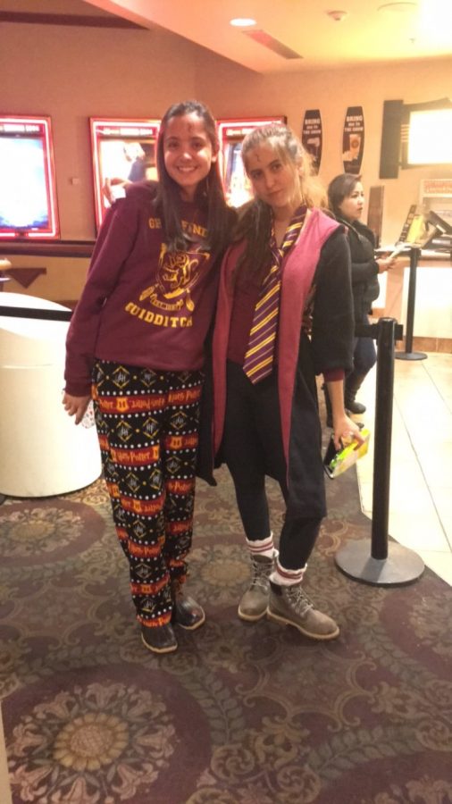 Caroline Sachdeva and Olivia Oksenhorn pose in their full Harry Potter garb for the Fantastic Beasts premier. 