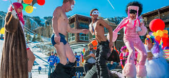 Men participating in the costume contest have a dance party.