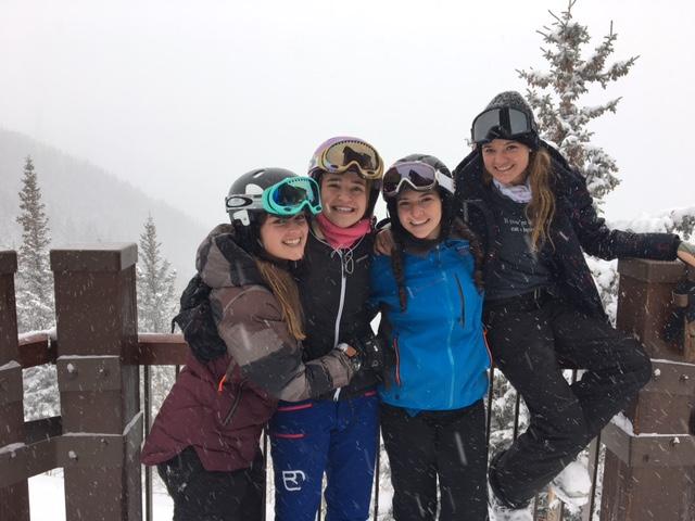 Seniors Carson Friedland, Mackenzie Miller, Sari Behr and Ella Horn last year during Ski Day. 