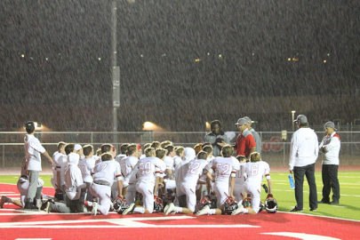 The Skiers huddled up in Grand Valley during the rain delay.
