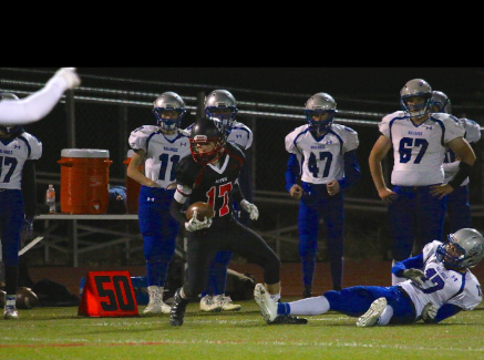 Junior Noah Hollander leaving Moffat County Bulldog on the turf and charging towards victory. 