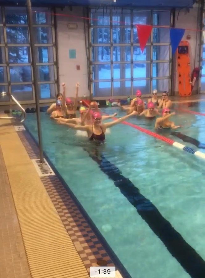 The AHS swim team doing a team building activity.