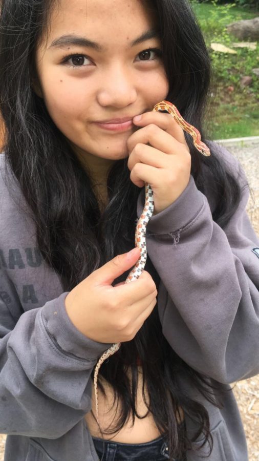 Talulah Marolt and her pet snake. 