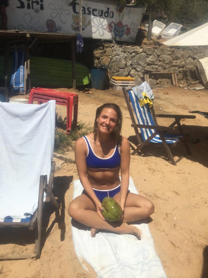 Bella Hoffman sits on the beach in Buzios, Brazil. 