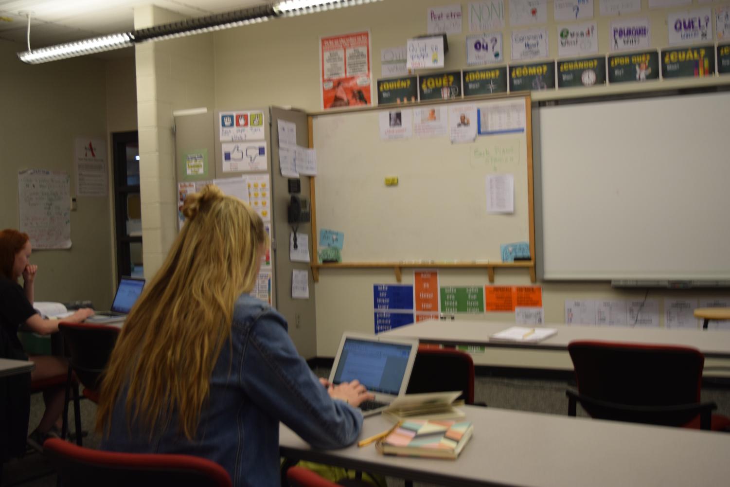 An AHS student working hard in Spanish class, in order to keep up with high academic expectations.