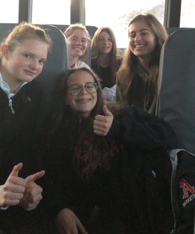 AHS track-stars on the bus driving to their track meet.