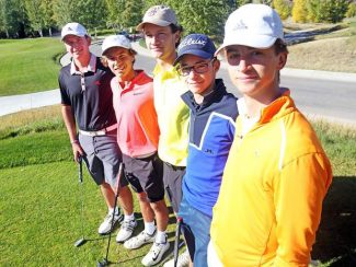 From the left, AHS boys golf team players Colter Zwieg, Jack Pevny, Dawson Holmes, Jack Hughes and Dominic Lanese take home a championship win for the Skiers October 1-2 
