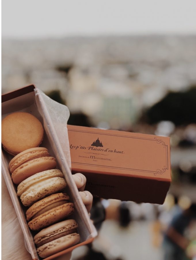 Paris, France. 
Macaroons and the city landscape of Paris, after climbing to the top of a hill to see a church and museum.