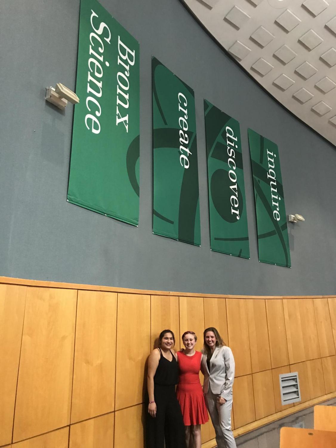 From left to right: Samantha Gonzalez, Tilly Swanson, and Taylor Patillo prepare for their debate event at the Bronx School of Science.