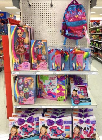 Array of Jojo products sold at Target in Glenwood, CO. Display includes Jojo doll, Jojo bows, and the Jojo slime kit.