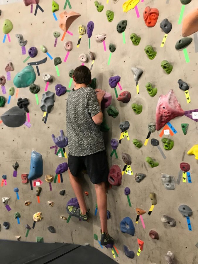 A member of the AHS climbing team practicing at the Red Brick