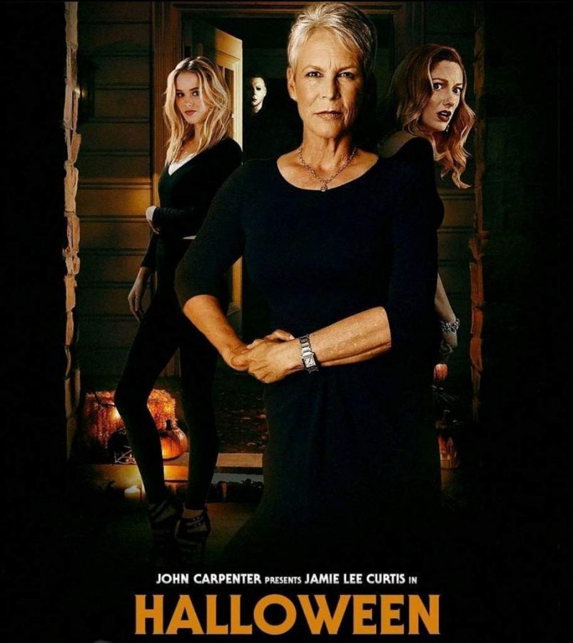 The cover of the new Halloween movie that pictures the characters of the movie.