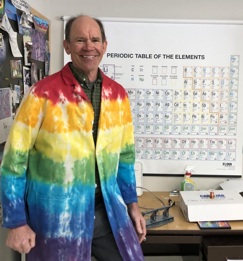 Retiring teacher, Andre Willie, pictured posing in his iconic tie-dye lab coat 