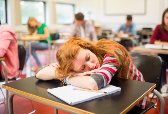 This ginger-haired sleeping beauty is a prefect representation of the entire senior classs mood. 
