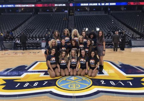 New head coach, Maddy Miller, posing for a picture with the Denver Nuggets. (Pictured center, 3rd row)