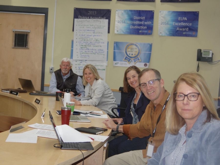 (From left to right) Tom Heald, superintendent of the ASD, Suzy Zimet, Susan Marolt, Dwayne Romero, and Sandra Peirce, current board members, at a recent board meeting.
