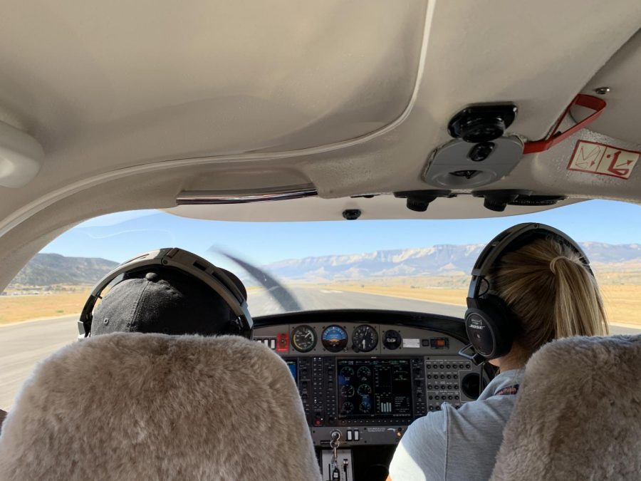 Kate Short taking off from Rifle County Airport with AHS Student Rance Pillans.