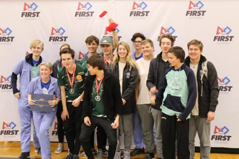 AHS robotic teams posing at States. From left to right: Samuel Vessey, Matilda (Tilly) Swanson, Storey Balko, Spencer Perley, Gavin Heil, Andrew Sebolt, Alex Appleby, Tatum Johnson, Alex Martin, Zack Small, Riley Dunn, Jack Fox, and Kyle Doolan.