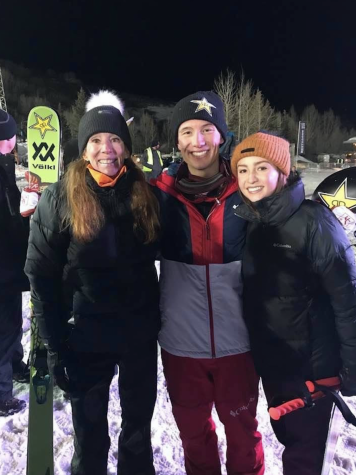 Alex Ferreira poses with his mom and sister after winning gold.