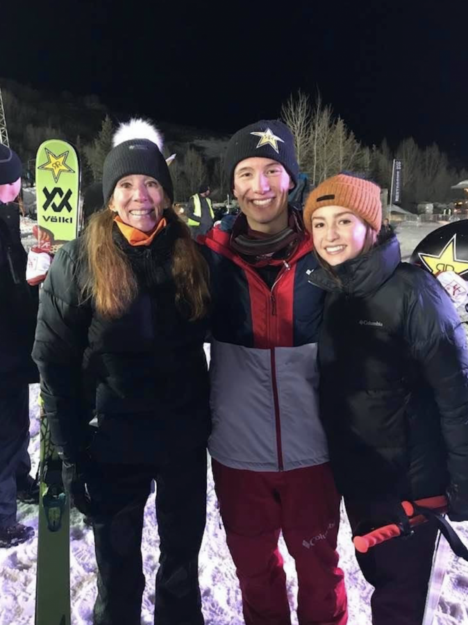 Alex Ferreira poses with his mom and sister after winning gold. 