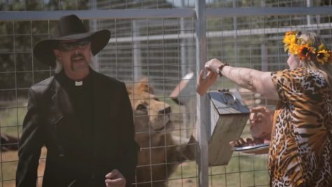 Carole Baskin look-alike feeding Don Lewis to a lion in Joe Exotic's music video