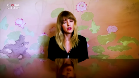 Taylor Swift singing an emotional song