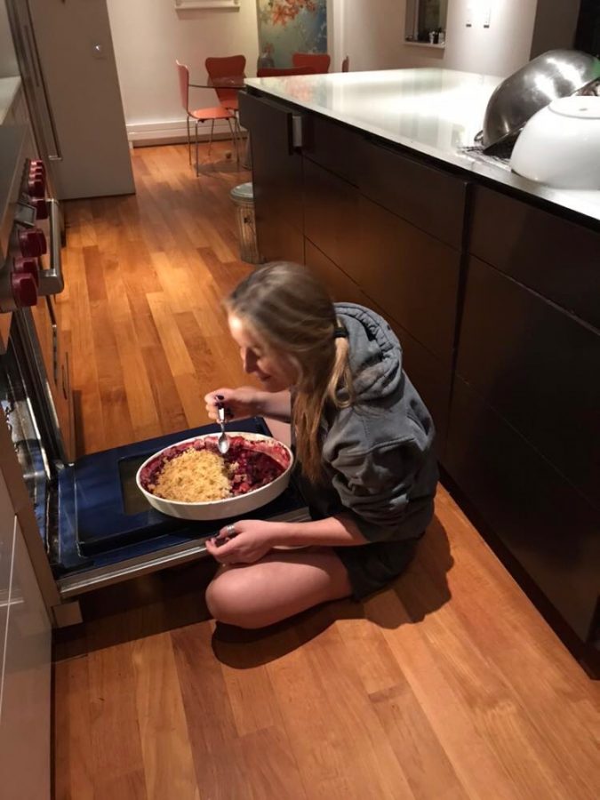 AHS student Gemma Hill enjoying eating a pie