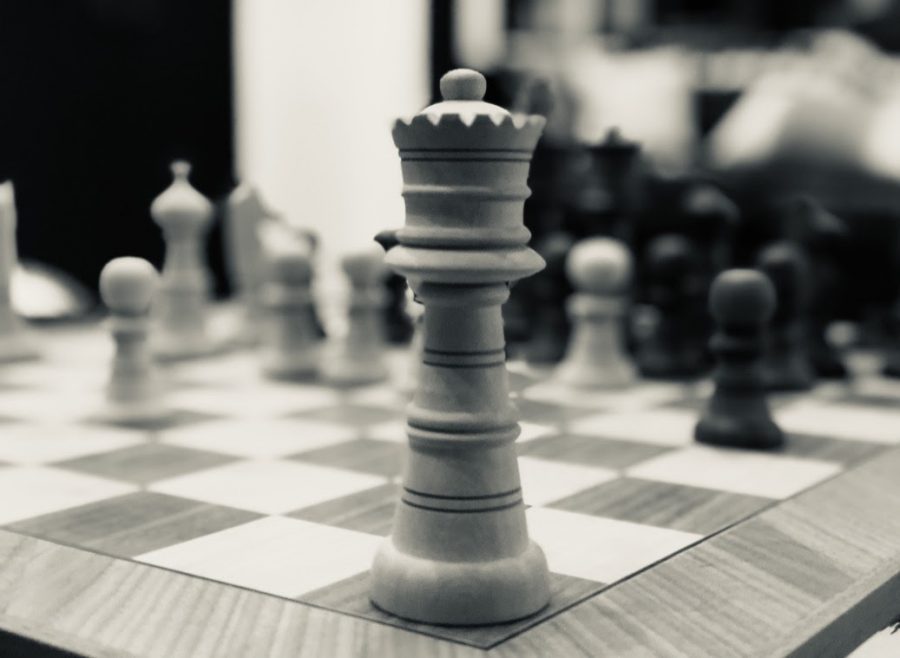 The Queen in her element on a Moroccan chessboard.