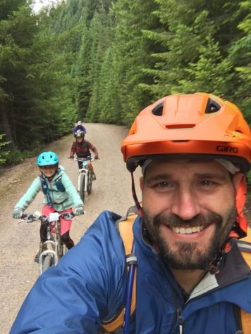Zevin biking with his kids. 
