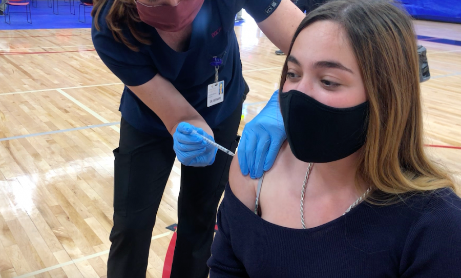 Maya Shindel, a student at Aspen High School, receives her Covid-19 vaccine.