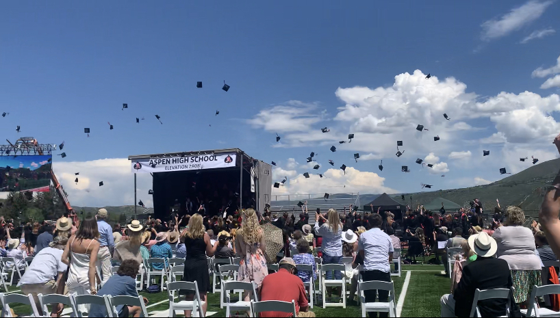 AHS Graduates throw their caps at the conclusion of the graduation ceremony on June 5, 2021.