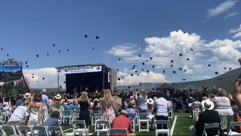 AHS+Graduates+throw+their+caps+at+the+conclusion+of+the+graduation+ceremony+on+June+5%2C+2021.