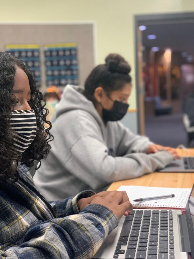 Gia Galindo Bartley and Areysi Galvan, freshmen at Aspen High School in Aspen Colo., working in class while wearing face masks on Wednesday, Sept. 29, 2021.
