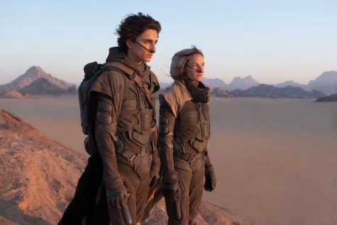 Lady Jessica (Rebecca Ferguson) stands alongside Paul Atreides (Timothée Chalamet) in Dune, which premiered in theaters on October 22nd.
