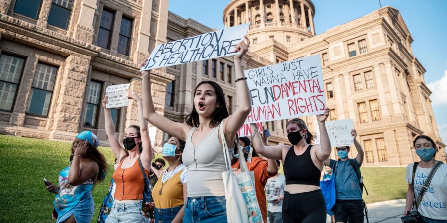 Pro-choice+demonstrators+march+at+the+Texas+State+Capitol+the+day+that+S.B.+8+took+effect.