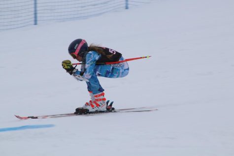 Aspen High School skier competes during the 2019 season. Alpine skiing is one of the sports affected by the protocol.