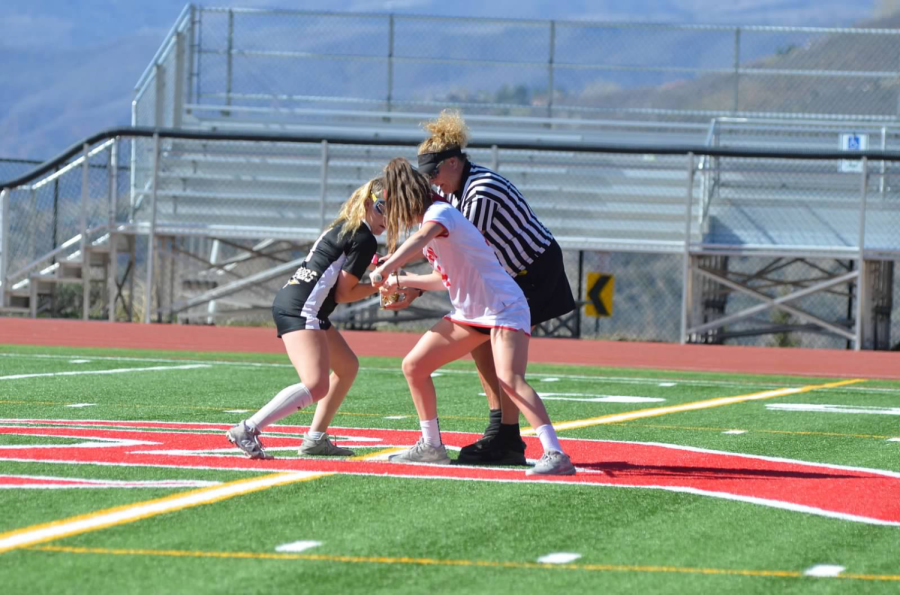 Aspen High School lacrosse faces off in a recent home game.