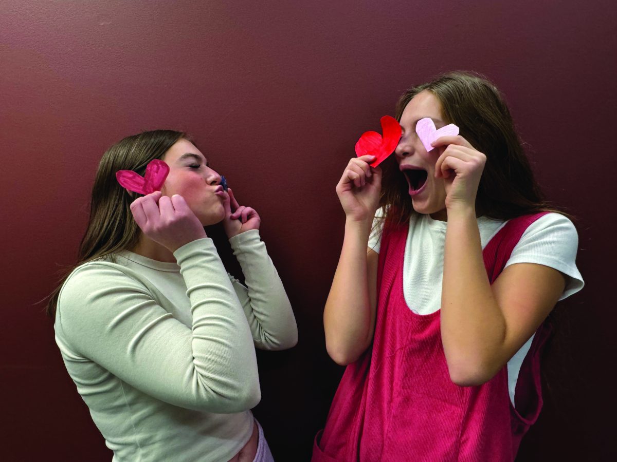 Seniors Addy Christensen and Rylee Smith build up with excitement toward the upcoming Valentines festivities. 