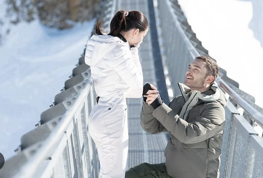 Ed Westick on one knee proposing to Amy Jackson in Gstaad