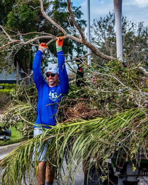 IMG Academy coach helping clean up athletic facilities after Hurricane Helene.