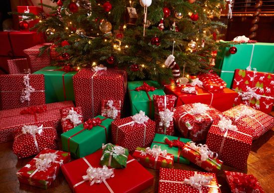 Wrapped gifts under a Christmas tree.